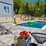 Luxury Andrea Vrzika In Forest Near The Sea With Heated Pool